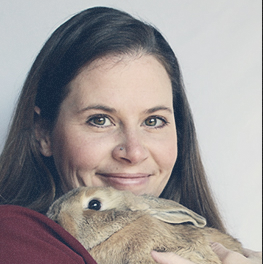 Heather Doucette holding a rabbit.