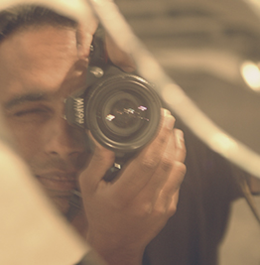 Tom Silva taking a picture.